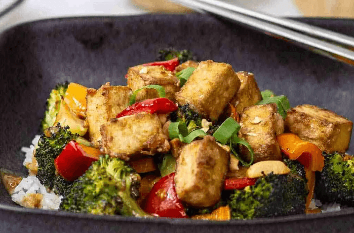 Roasted Veggies in Peanut Sauce with Crispy Tofu — high-protein recipe photo